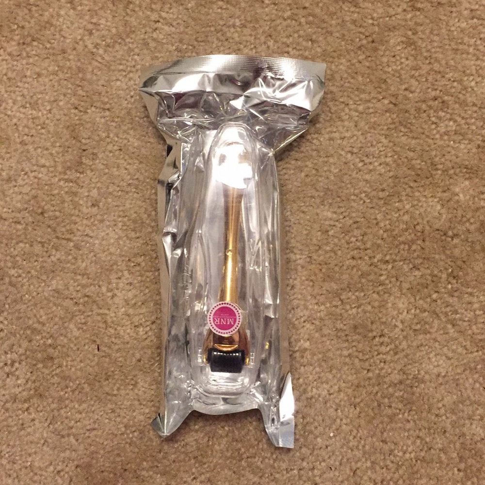 Gold dermaroller new in package